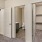 a bedroom view of closet and bathroom