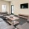 a living room with a tv and couches
