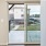 a room with a glass door and a balcony