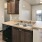 a kitchen with wooden cabinets