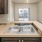 a kitchen with a marble countertop